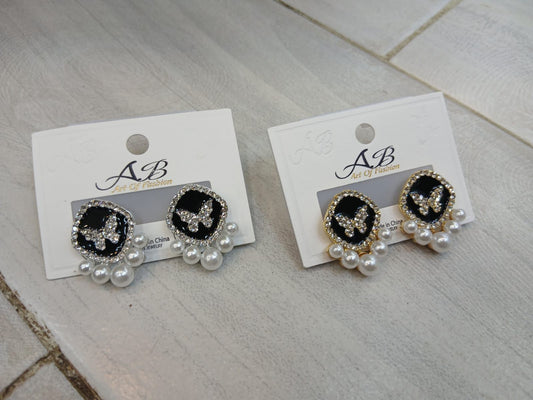Butterfly Pearl Stud Earrings.