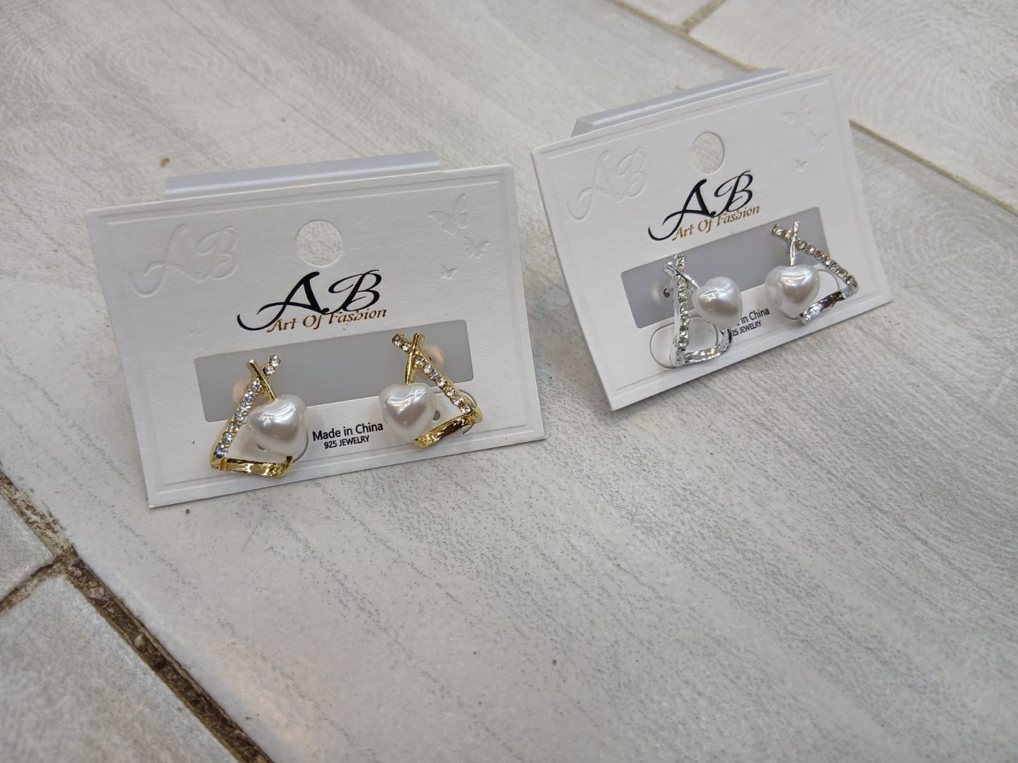 Pearl and crystal heart earings