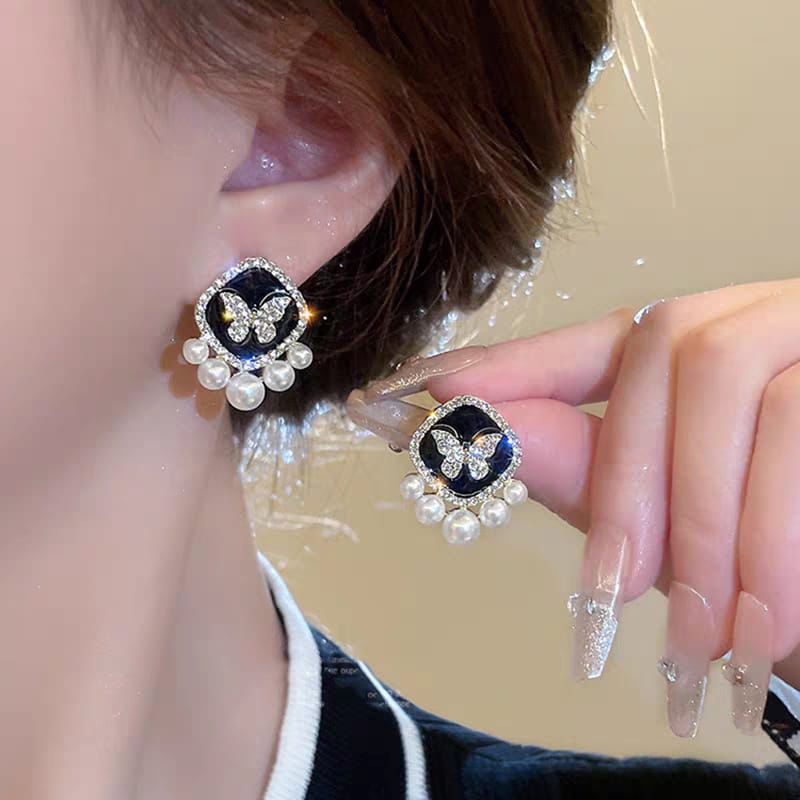 Butterfly Pearl Stud Earrings.