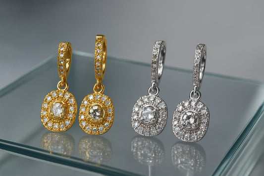 Diamond frame drop earrings.